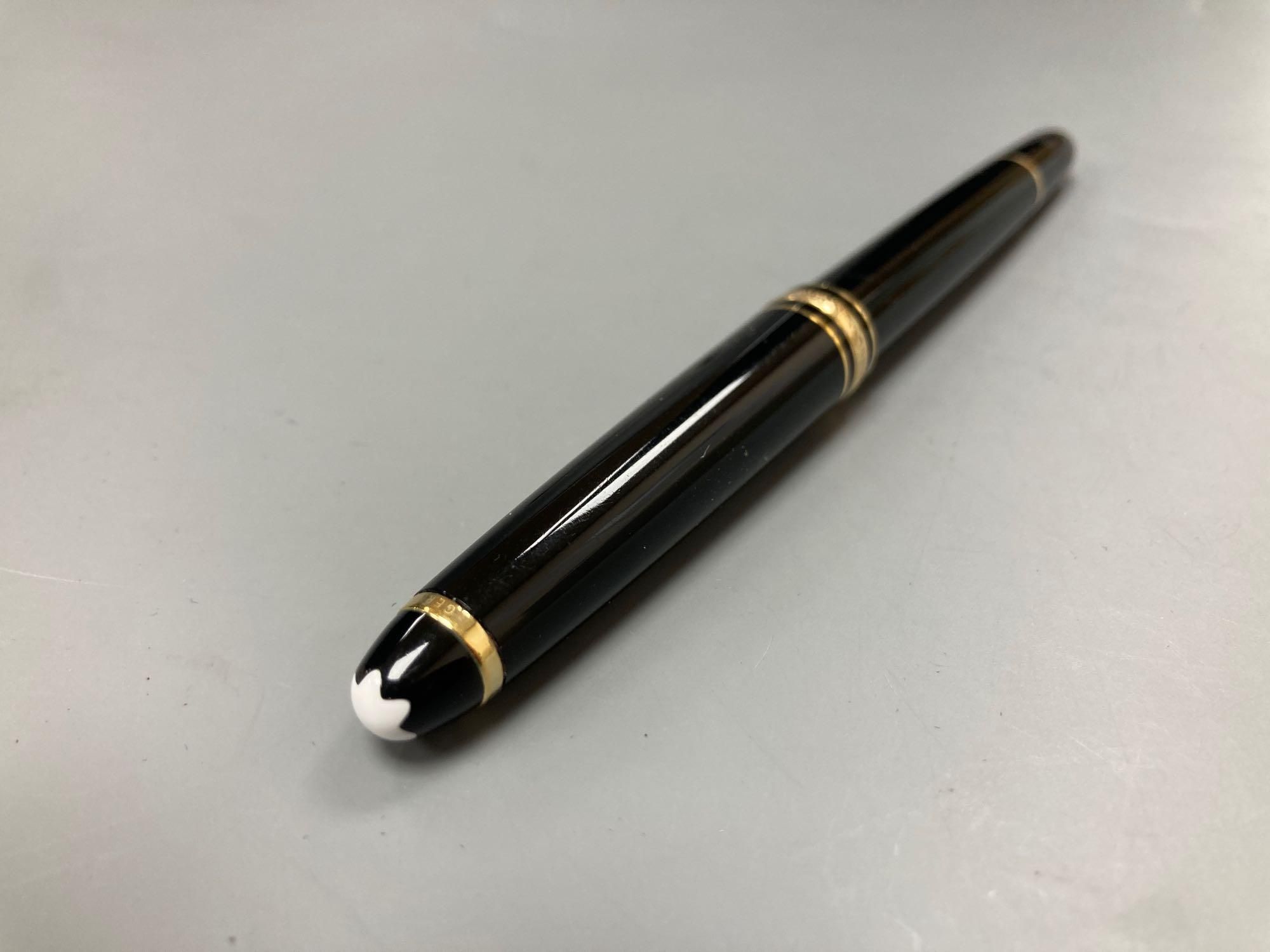 A Mont Blanc fountain pen and a belt